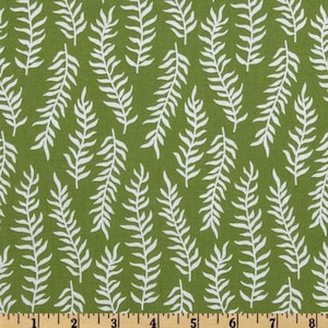 Könnte beinhalten: Grüner Stoff mit einem weißen Blatt-Muster. Der Stoff wird mit einem Maßband gezeigt.