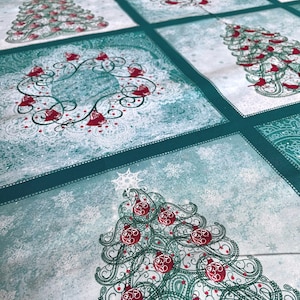 May include: A Christmas-themed fabric with a repeating pattern of Christmas trees, wreaths, and snowflakes. The design features teal, white, and red colors. The Christmas trees are adorned with red ornaments.