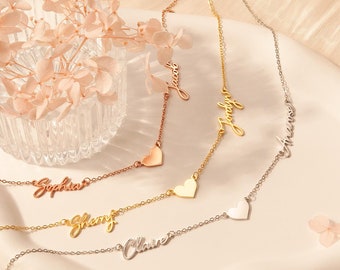 May include: Four gold necklaces with heart charms and personalized nameplates. The names on the necklaces are Sophia, Sherry, Claire, and Jaqueline.