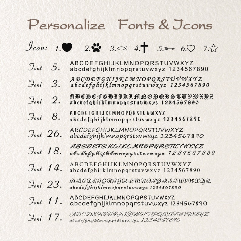 May include: A chart showing different font styles and icons for personalization. The chart includes a heart, paw print, fish, cross, arrow, star, and various font styles with the alphabet and numbers.