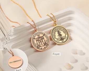 May include: Two gold necklaces with round pendants. The front of the pendant on the left necklace features the University of Southern California logo with the text "University of Southern California" and "1880". The back of the pendant features the Roman numeral inscription "VII.I.MMXXIII". The front of the pendant on the right necklace features the Stanford University logo with the text "Leland Stanford Junior University" and "1891".