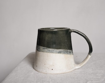 Small handmade ceramic mug in charcoal & off-white glaze
