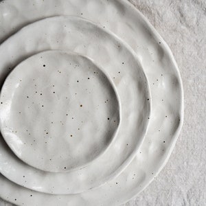 White flecked handmade ceramic plates