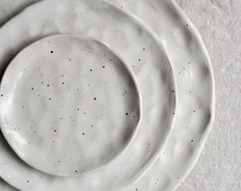 White flecked handmade ceramic plates