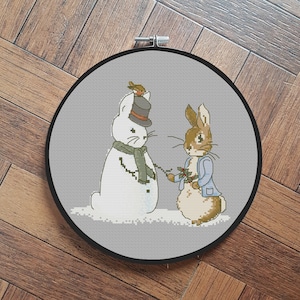 FREE- FREE - FREE : Peter rabbit at Christmas - cross stitch pattern