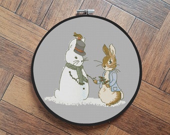 FREE- FREE - FREE : Peter rabbit at Christmas - cross stitch pattern