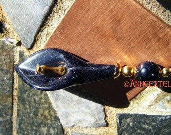 Hatpin with blue Goldstone Flower