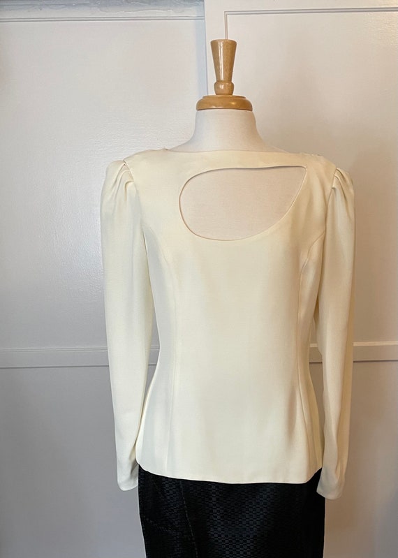 Beautiful Galinos cream colored, long sleeve blous