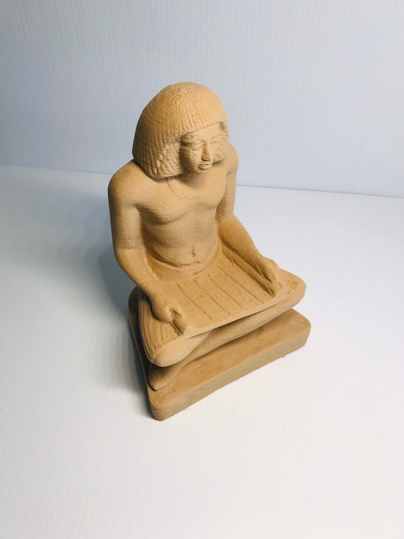 statue of seated scribe statue of seated scribe