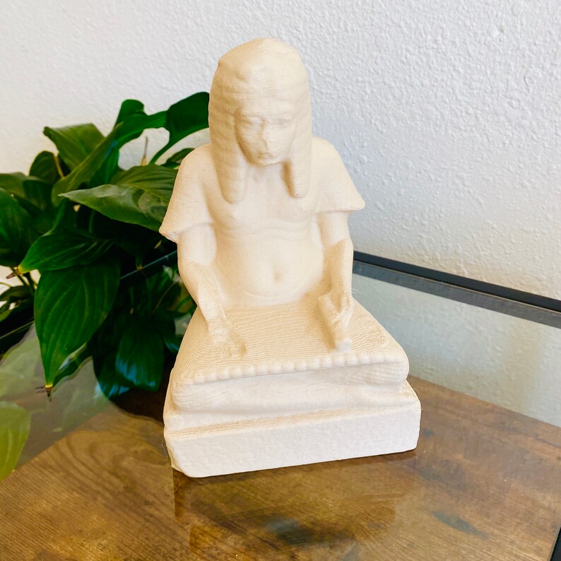 statue of seated scribe statue of seated scribe