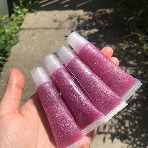 None-sticky multi Vitamin lip gloss made with essential oils by gloss.line
