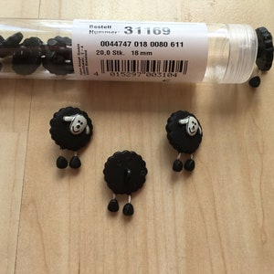 Sheep buttons with dangling legs 18 mm black 2 pieces