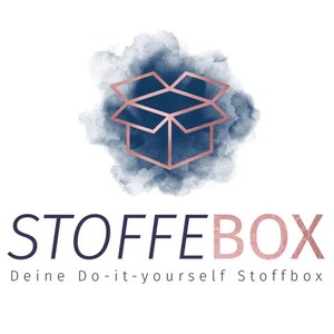 May include: A logo for a company called "Stoffebox" with the tagline "Deine Do-it-yourself Stoffbox". The logo features a stylised open box with a blue background and a rose gold outline. The logo is set against a watercolour background.