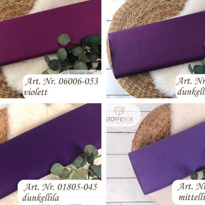 May include: Four fabric swatches in different shades of purple. The swatches are labeled with their article numbers and color names: "Art. Nr. 06006-053 violett", "Art. Nr. 06006-052 dunkellila", "Art. Nr. 01805-045 dunkellila", and "Art. Nr. 01805-143 mittellila".