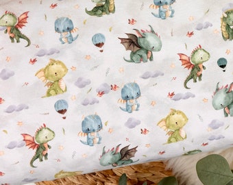 French Terry fabric – sweet baby dragons in light beige – Oeko-Tex 100 No. 301-090 from 50 cm