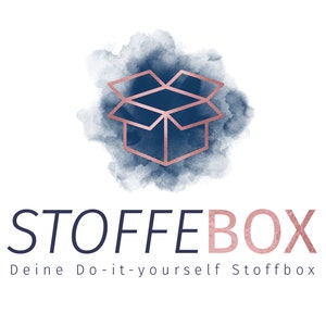 May include: A logo for a company called "Stoffebox" with the tagline "Deine Do-it-yourself Stoffbox". The logo features a stylized open box with a blue background and a rose gold outline. The logo is set against a watercolor background.