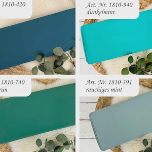 May include: Four fabric swatches in different shades of blue and green. The swatches are labeled with their color names and corresponding article numbers: petrol, dunkelmint, tannengr&uuml;n, and rauchiges mint.
