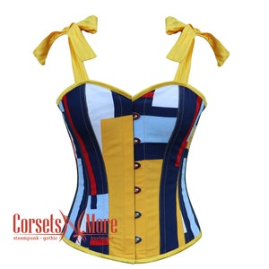 May include: A yellow, blue, red, and white striped corset with yellow straps and bows. The corset has a sweetheart neckline and is made of a cotton fabric. The corset is a type of undergarment that is worn to shape the body.