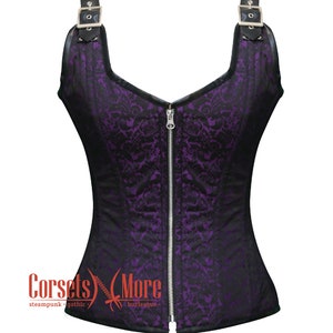May include: Purple and black brocade corset with a zip fastening and adjustable straps. The corset has a sweetheart neckline and a fitted silhouette.
