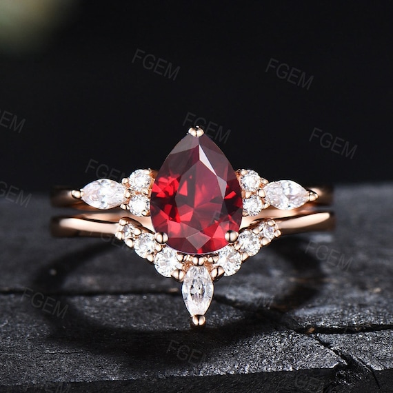 Pear shaped ruby and hotsell diamond ring