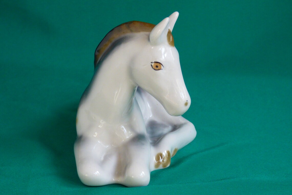 white porcelain horse statue