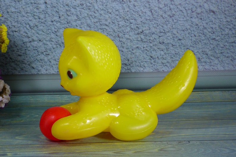 Plastic yellow soviet toy Bright yellow animal figurine Russian plastic toy cat Russian kids toy Vintage toy yellow cat with red ball