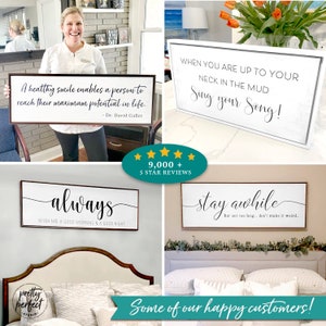 May include: Four wooden signs with inspirational quotes. The signs are white with black lettering and have a rustic wood frame. The quotes are: "A healthy smile enables a person to reach their maximum potential in life. - Dr. David Galler", "always wish me a good morning & a good night", "When you are up to your neck in the mud Sing your Song!" and "stay awhile but not too long... don't make it weird..."