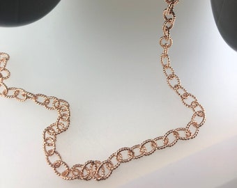 Chain sold by the meter; chiseled link chain, 7 x 5 mm, silver-plated brass or rose gold, very high quality, produced in Germany;