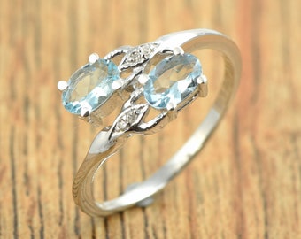 Faceted Aquamarine Sterling Silver Ring: Oval Prong Setting