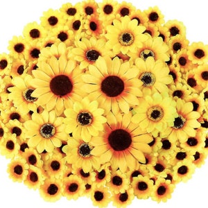 May include: A large bunch of yellow artificial sunflowers with brown centers. The flowers are arranged in a circular shape, creating a full and vibrant display.