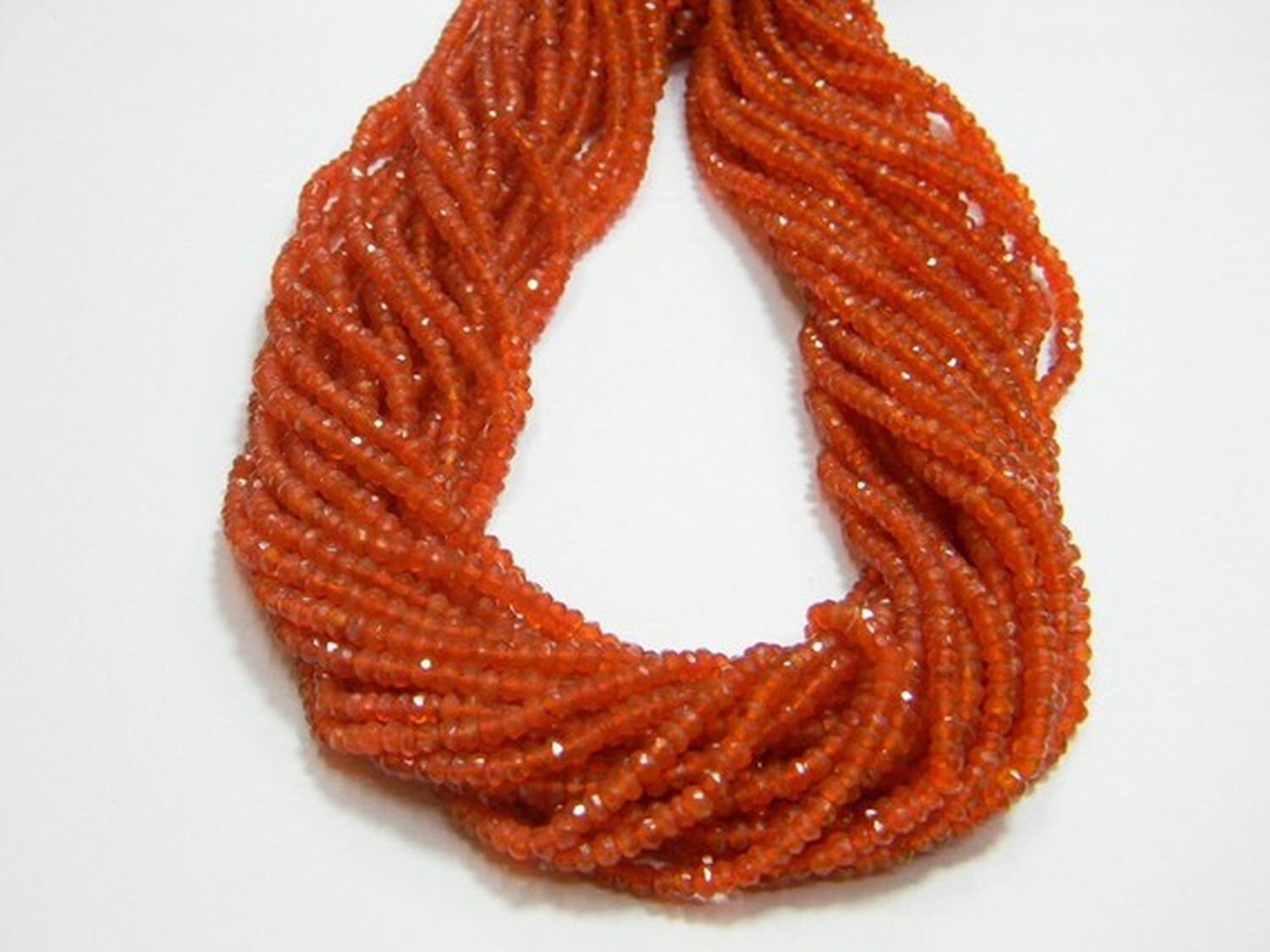 Carnelian Micro Faceted Round 14 inch strand pack of 2 strands 4 mm approx Carnelian Micro Faceted Round 14 inch strand pack of 2 strands 4 mm approx