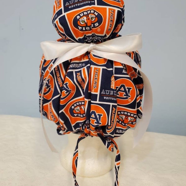 High bun scrub cap,  made from licensed auburn fabric