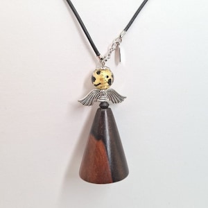 Long leather lace and angel pendant in Murano glass and ebony wood. Unique model