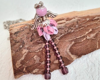 Long steel chain with Murano glass doll pendant and trimmings