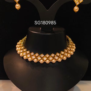Designer Indian Kundan Choker necklace set of golden and white pearls with stunning earrings for girls/women