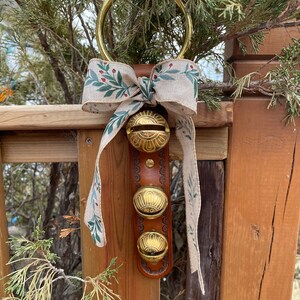 Christmas sleigh bell door hanger