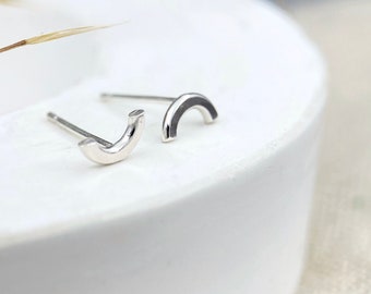 Cute tiny silver curved studs, made from sterling silver