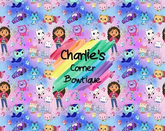 May include: A colorful seamless pattern featuring a cartoon girl with brown hair, a cat, and a rainbow. The text "Charlie's Corner Bowtique" is written in a rainbow font.