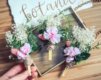 Pink cherry blossom boutonnieres