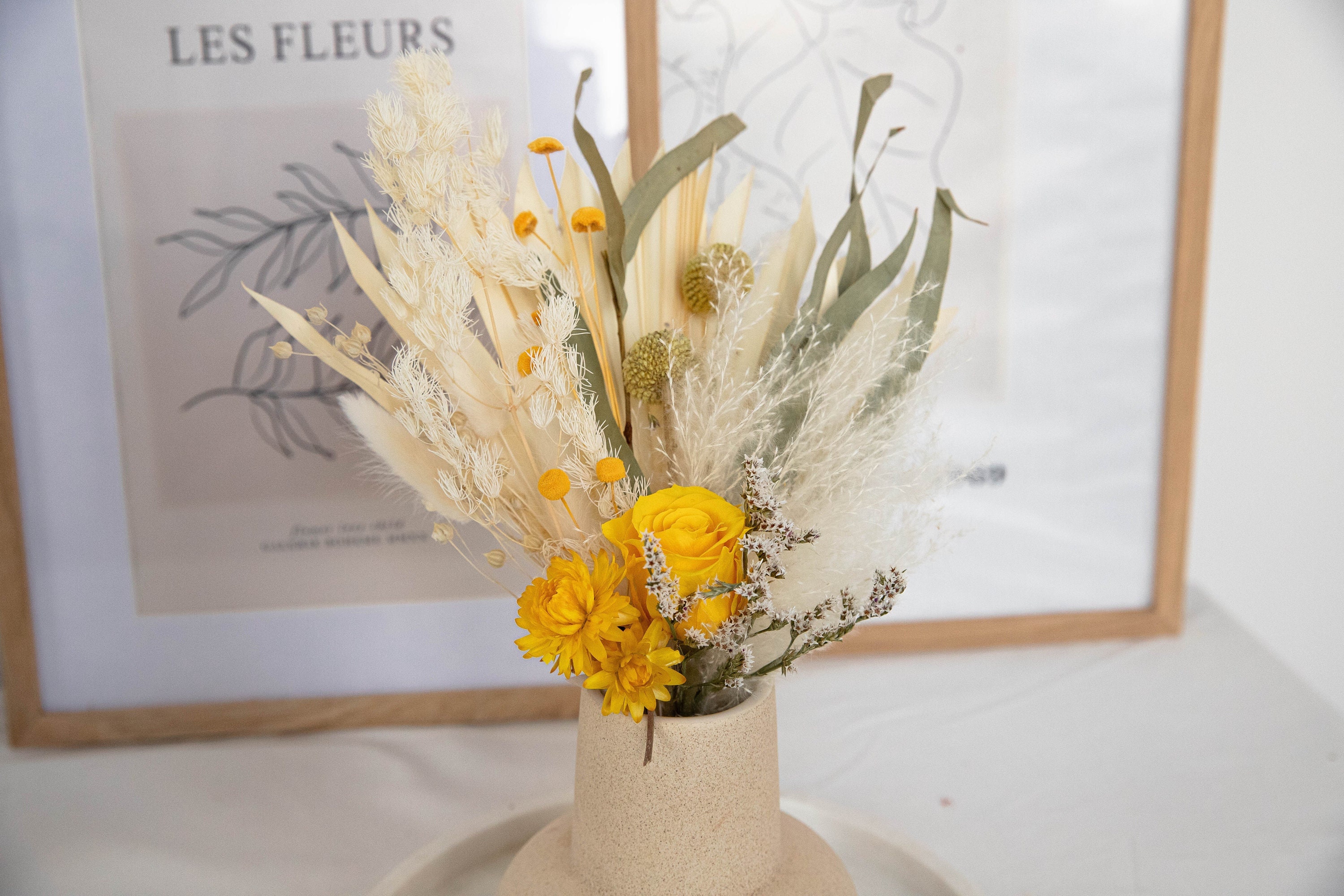 dried flower bud vase arrangement