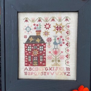 Pansy Patch Quilts & Stitchery - Peacock Manor - Originaldesign av Lori Pengelly