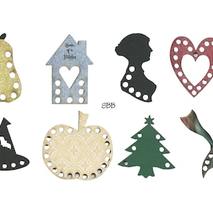 Puede incluir: Ocho formas diferentes de cuencos de lana de madera, incluyendo una pera, una casa, una silueta, un corazón, un sombrero de bruja, una manzana, un árbol de Navidad y una cola de sirena. Cada forma tiene agujeros alrededor del borde para enrollar la lana.