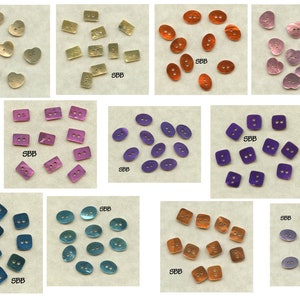 May include: Assortment of 10 different colors of iridescent shell buttons in various shapes, including heart, oval, square, and rectangle. The buttons are all approximately 1 inch in diameter.