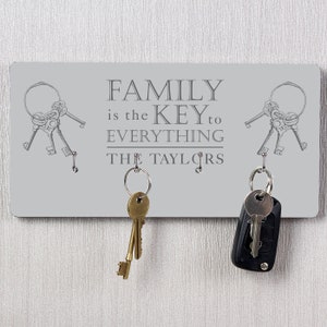 Personalised key ring holder for wall / Key hanger with the family name /  Pet paw print / Personalized housewarming gift