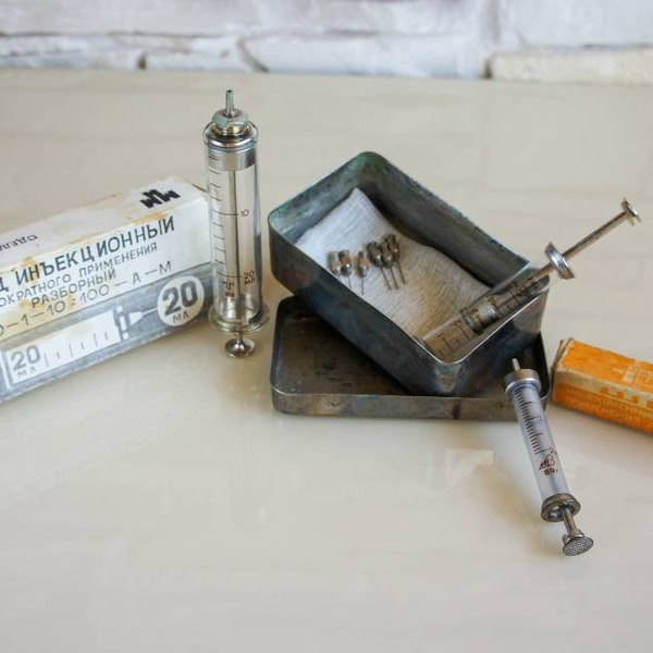 Vintage medical syringes,  Glass syringe, Medical tools, medical sterilizer, antique syringe, syringe with needle,