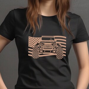 May include: A black t-shirt featuring a brown silhouette of a jeep driving in front of an American flag.