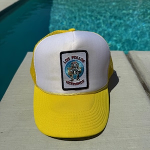 Slightly Used White and Yellow Mesh Trucker Hat with Los Pollos Hermanos Logo