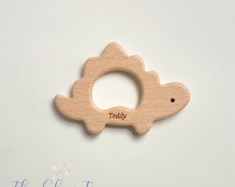 Mordedor de dinosaurio de madera personalizado, lindo juguete de dinosaurio, juguete de estegosaurio, juguete de dentición de madera de alta calidad, orgánico, regalo para bebés, mordedor para bebés