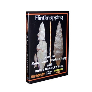 May include: A DVD case with a black background and orange text. The case features a two-disc set of "Flintknapping featuring Solutrean Technology with Bruce Bradley PHD".