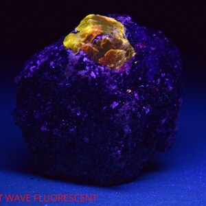 20 Gram Fluorescent Terminated Red Zircone Crystal Specimen